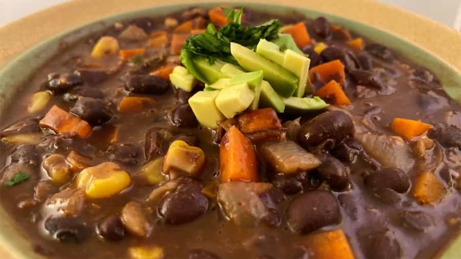 A chunky, hearty soup made with black beans, garlic, carrots, and jalapeño for some spiciness and zest. Vegan Vegetarian and gluten free